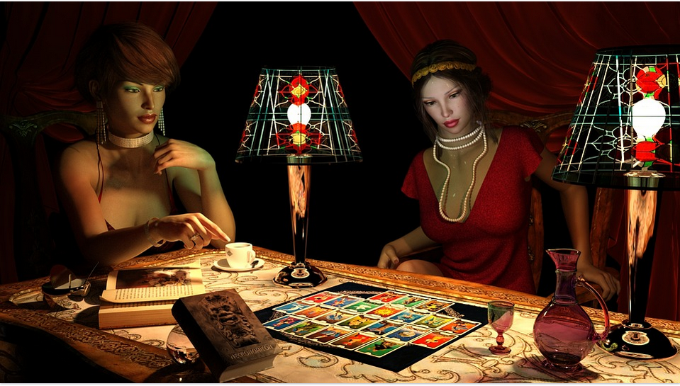 two ladies doing tarot reading